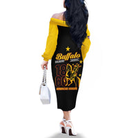 Black off-shoulder long sleeve dress with yellow sleeves and “American heroes” back print