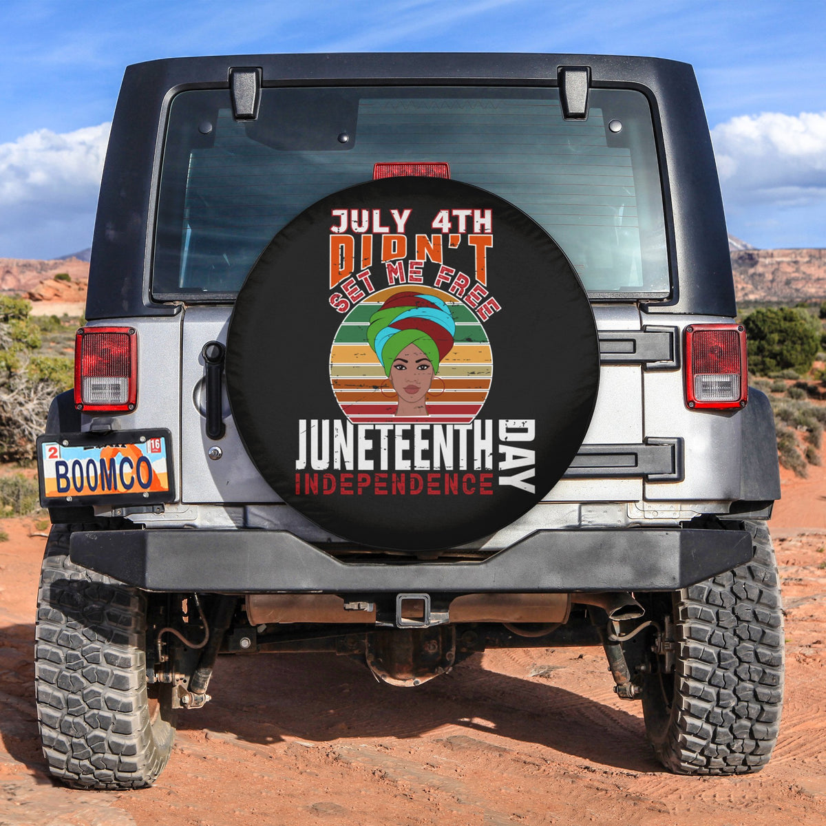 Black Juneteenth spare tire cover with circular July 4th graphic and Independence Day text