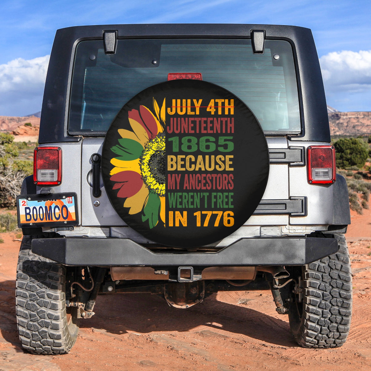 Black spare tire cover with sunflower and July 4th Juneteenth 1865 text design