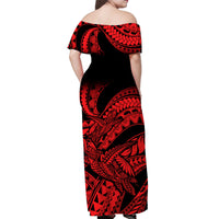 Off-shoulder long dress, back view; black base with red Polynesian-style motifs