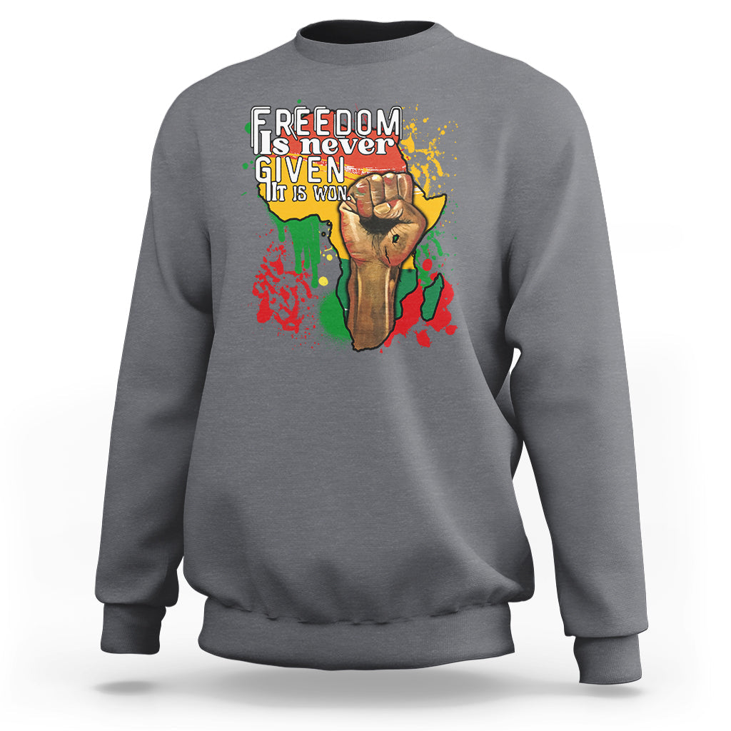 Charcoal gray crewneck sweatshirt with colorful freedom graphic on the chest