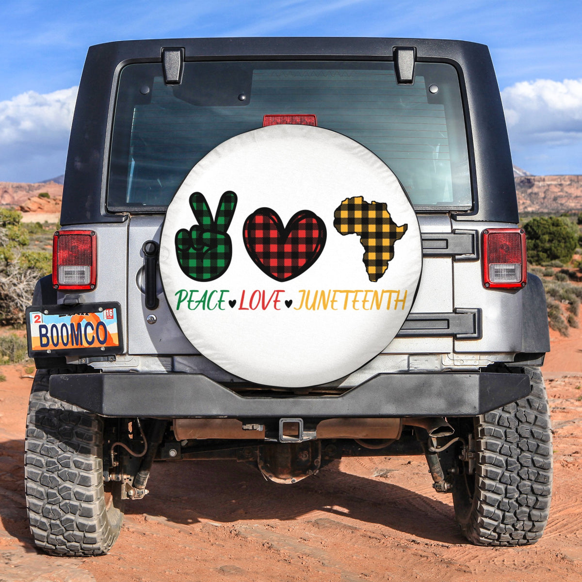 Spare tire cover with peace, love, and Juneteenth text, hearts, and Africa map graphic