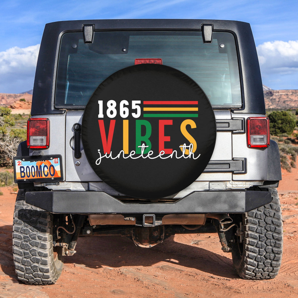 Juneteenth spare tire cover, black with '1865 Vibes Juneteenth' lettering and stripes