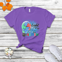 Purple autism awareness T-shirt featuring colorful puzzle graphic and “Light it up for Autism”