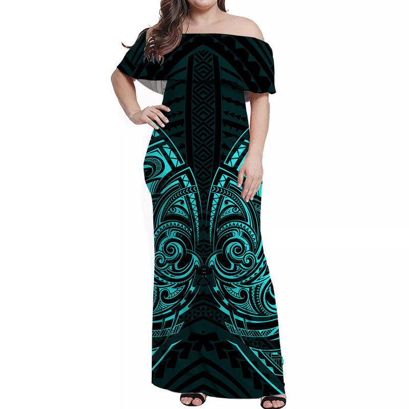 Off-shoulder long dress with tribal print, dark green and turquoise.