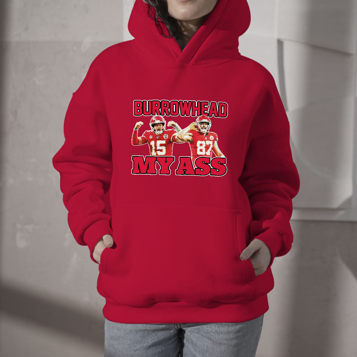 Red kids hoodie with front 'BURROWHEAD MY ASS' sports graphic.