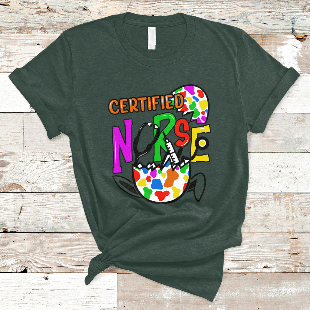 Forest green nurse Easter T-shirt with colorful "CERTIFIED NURSE" and egg graphic