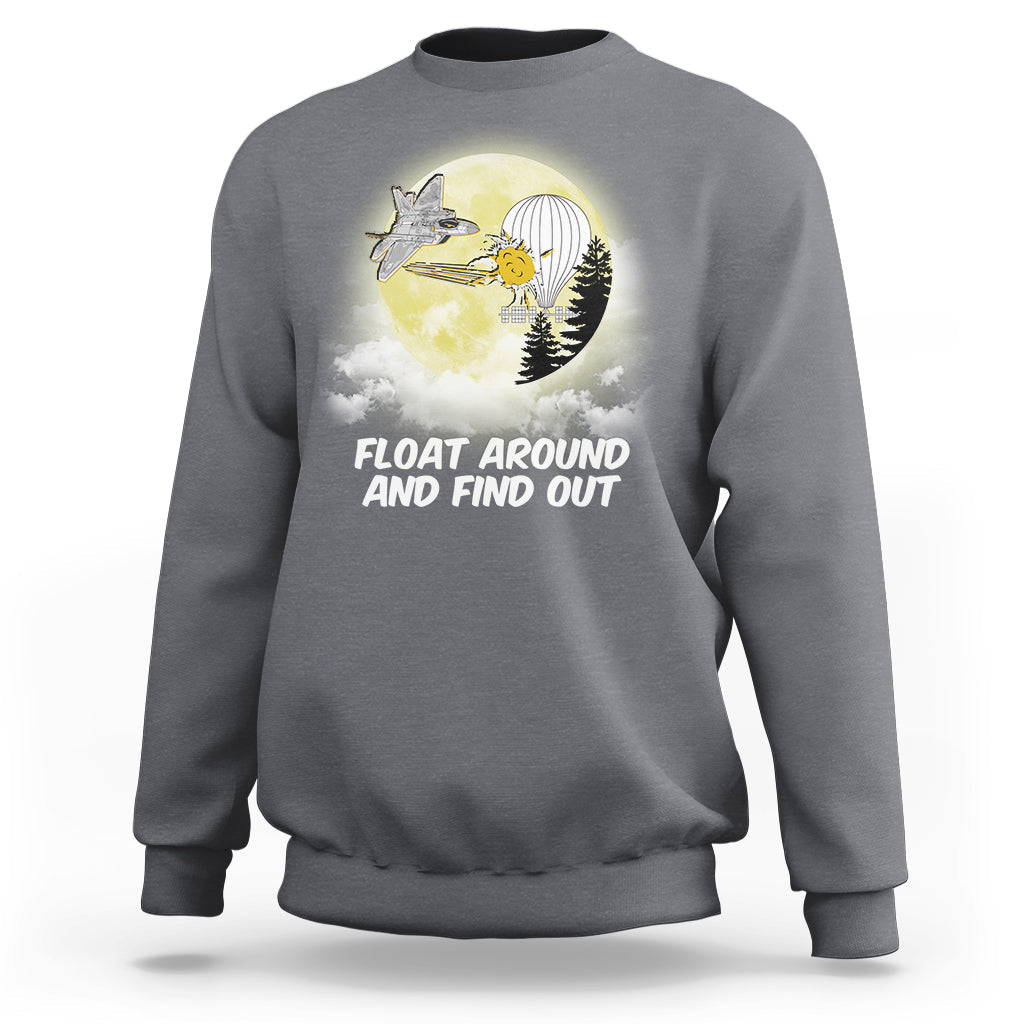 Charcoal gray crewneck sweatshirt with graphic and text “FLOAT AROUND AND FIND OUT”