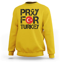 Yellow sweatshirt with front “PRAY FOR TURKEY” graphic and Turkish flag emblem