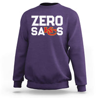 Purple crewneck sweatshirt with “ZERO SACKS” graphic on the front