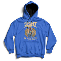 Royal blue pullover hoodie with front eagle graphic, 'Night Auditor' and 'In Progress' text.