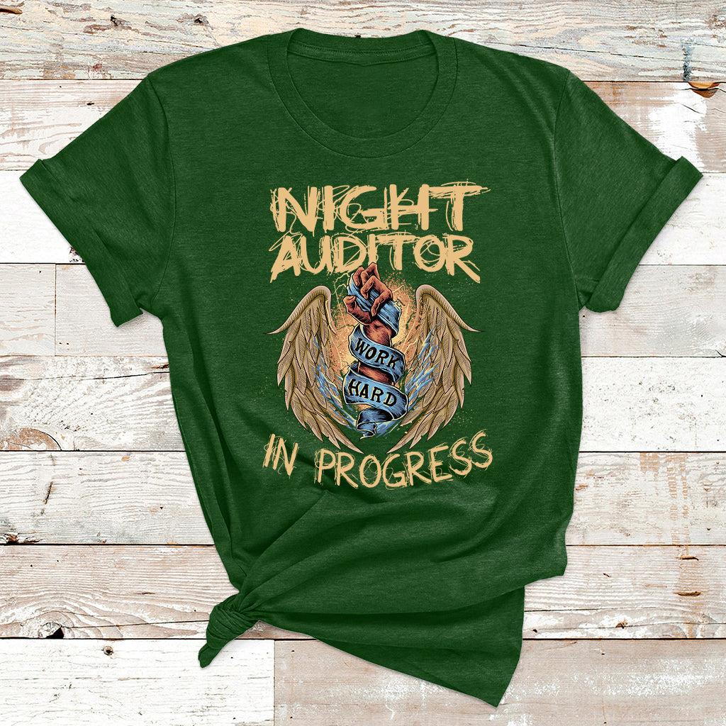 Night Auditor graphic T-shirt in forest green, angel badge reading 'Night Auditor' 'In Progress'