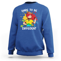 Royal blue boys autism awareness sweatshirt with colorful “Dare to be Different” graphic