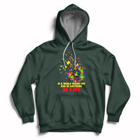 Forest green autism awareness hoodie with “Be Kind” sunflower graphic and front pocket