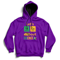 Purple science hoodie with front graphic reading “Let’s Taco Bout SCIENCE”.