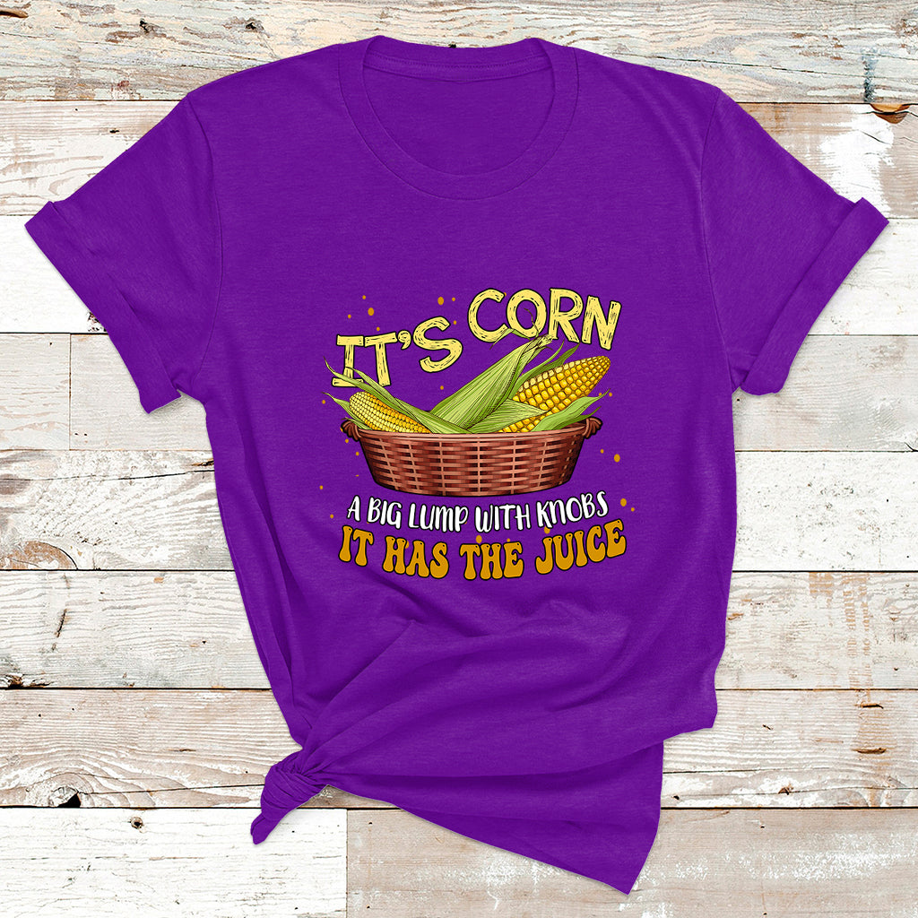 Purple graphic corn T-shirt with basket illustration and 'IT HAS THE JUICE' text