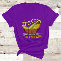 Purple graphic corn T-shirt with basket illustration and 'IT HAS THE JUICE' text
