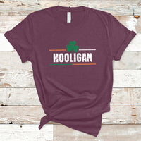 St. Patrick's Day graphic t-shirt in maroon with green clover and HOOLIGAN text.