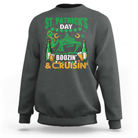 Dark heather gray crewneck sweatshirt with green St. Patrick's Day cruise graphic, 'Boozin' & Cruisin'