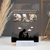 Acrylic table sign on display with dad silhouette, clouds, and custom photo collage