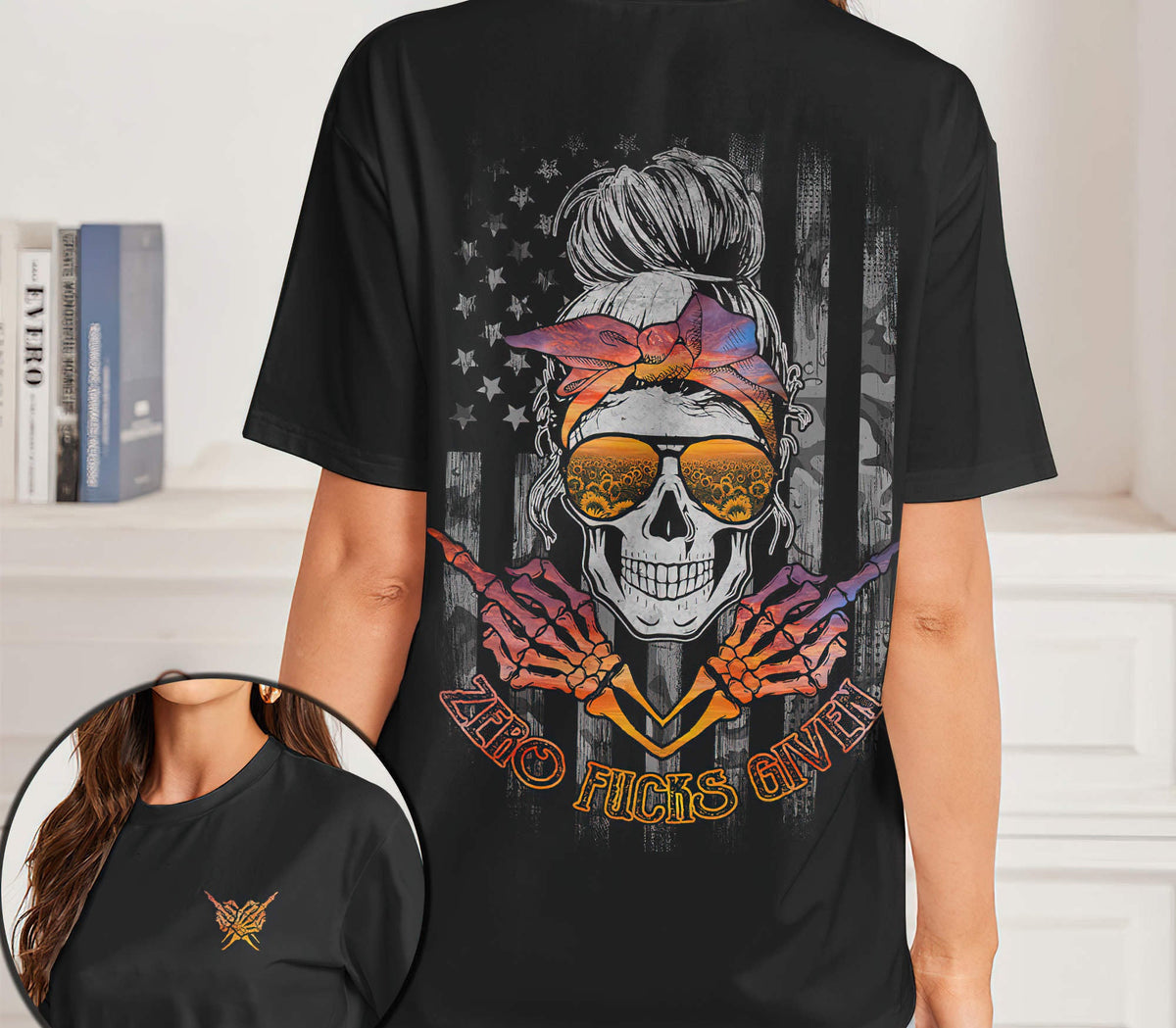 Black graphic T-shirt with skull sunglasses, stars, and “Zero Fcks Given” text
