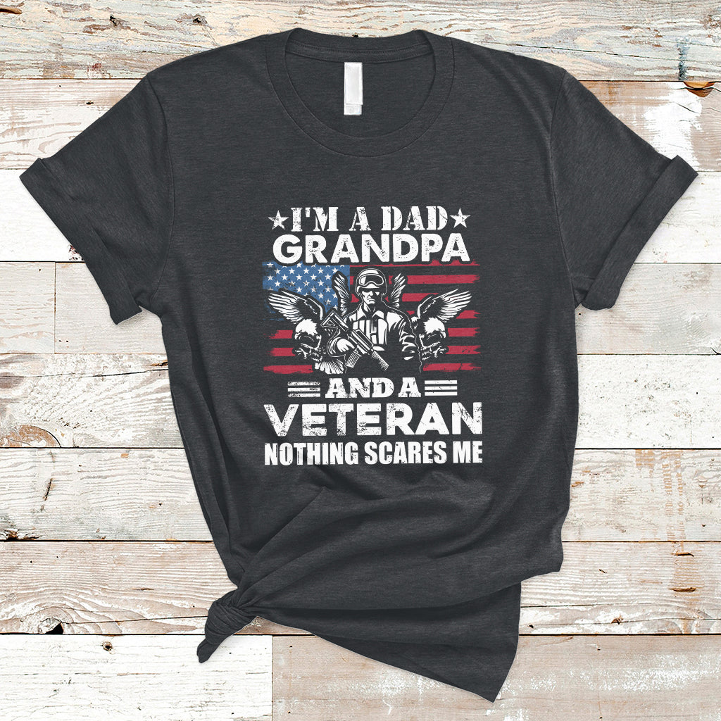 Dark gray crewneck T-shirt with veteran graphic text and 'Nothing scares me'.