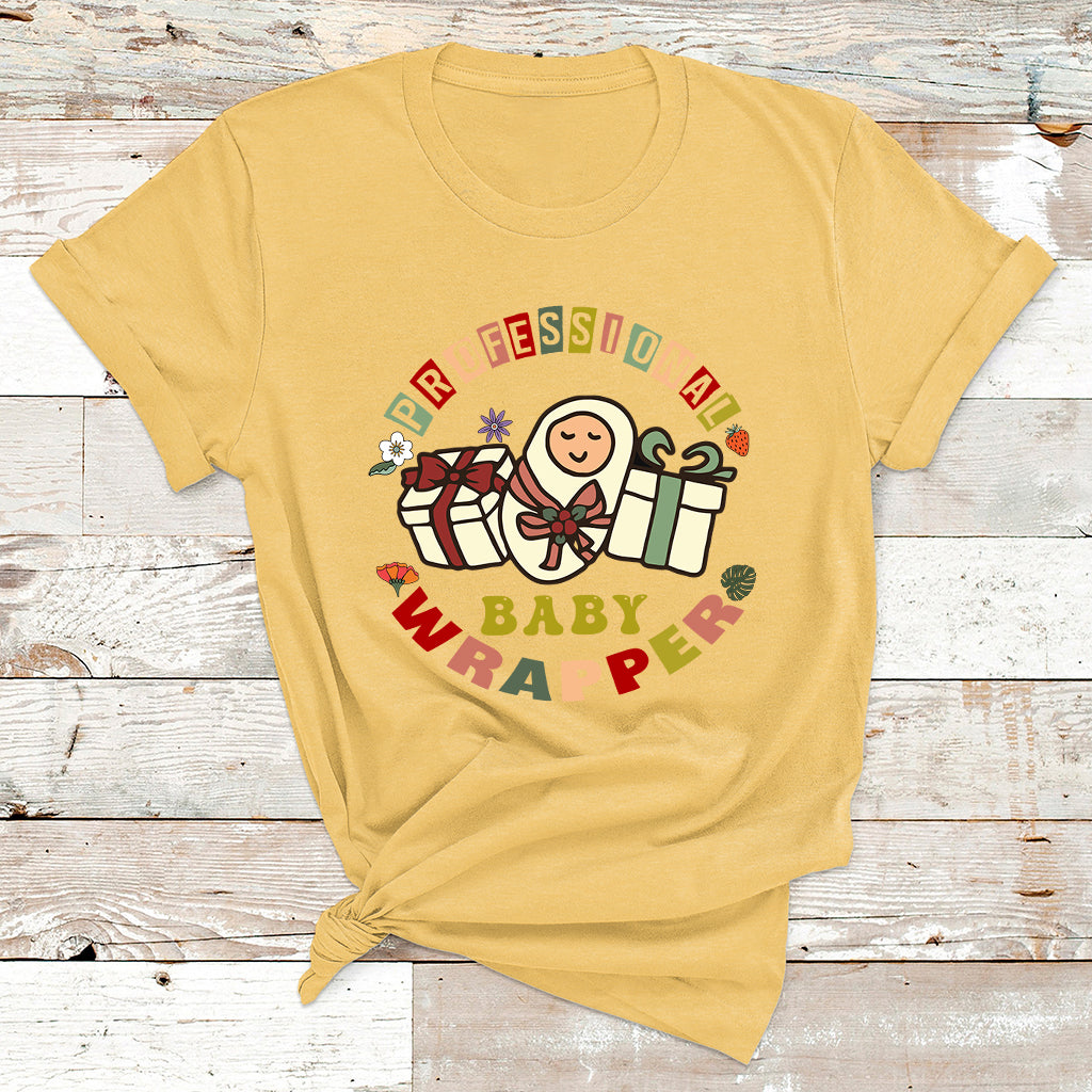 Nurse baby wrapper T-shirt in daisy yellow with colorful nurse-themed baby graphic
