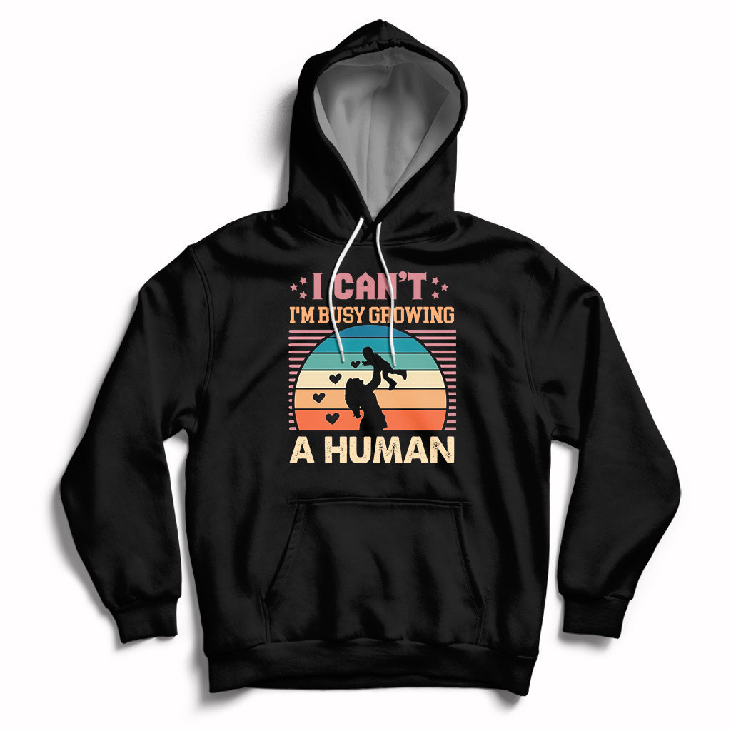 Black maternity pullover hoodie with kangaroo pocket and drawstring hood; busy human graphic