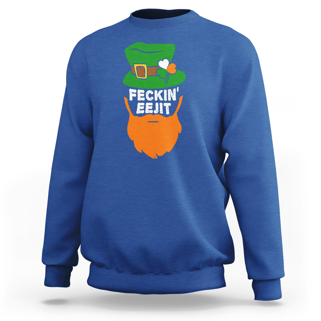 Royal blue sweatshirt with front graphic: green hat and orange beard with text, crew neck.