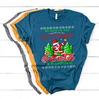 Royal blue Santa is watching graphic t-shirt with “Be Nice To The Auctioneer” text