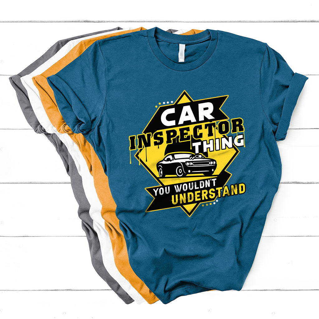 Blue short-sleeve T-shirt with yellow car inspector graphic and text