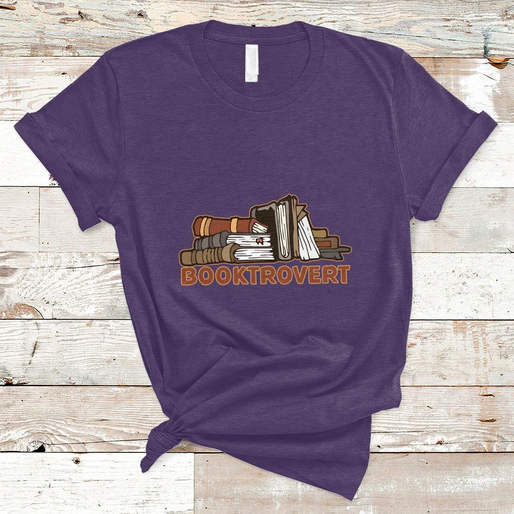 Purple crew-neck T-shirt with stacked book graphic and "BOOKTROVERT" text