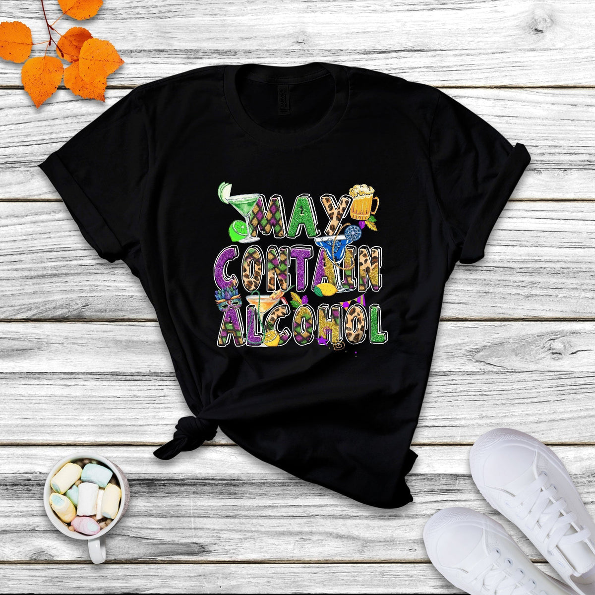 Black T-shirt with colorful “May contain alcohol” graphic and party drink icons on front
