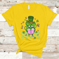 Daisy yellow T-shirt with cartoon leprechaun clover holding an open book graphic