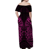 Off-shoulder maxi dress back view with tribal swirl print, black base and pink accents