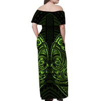 Off-shoulder long dress, dark green and neon green tribal print, back view