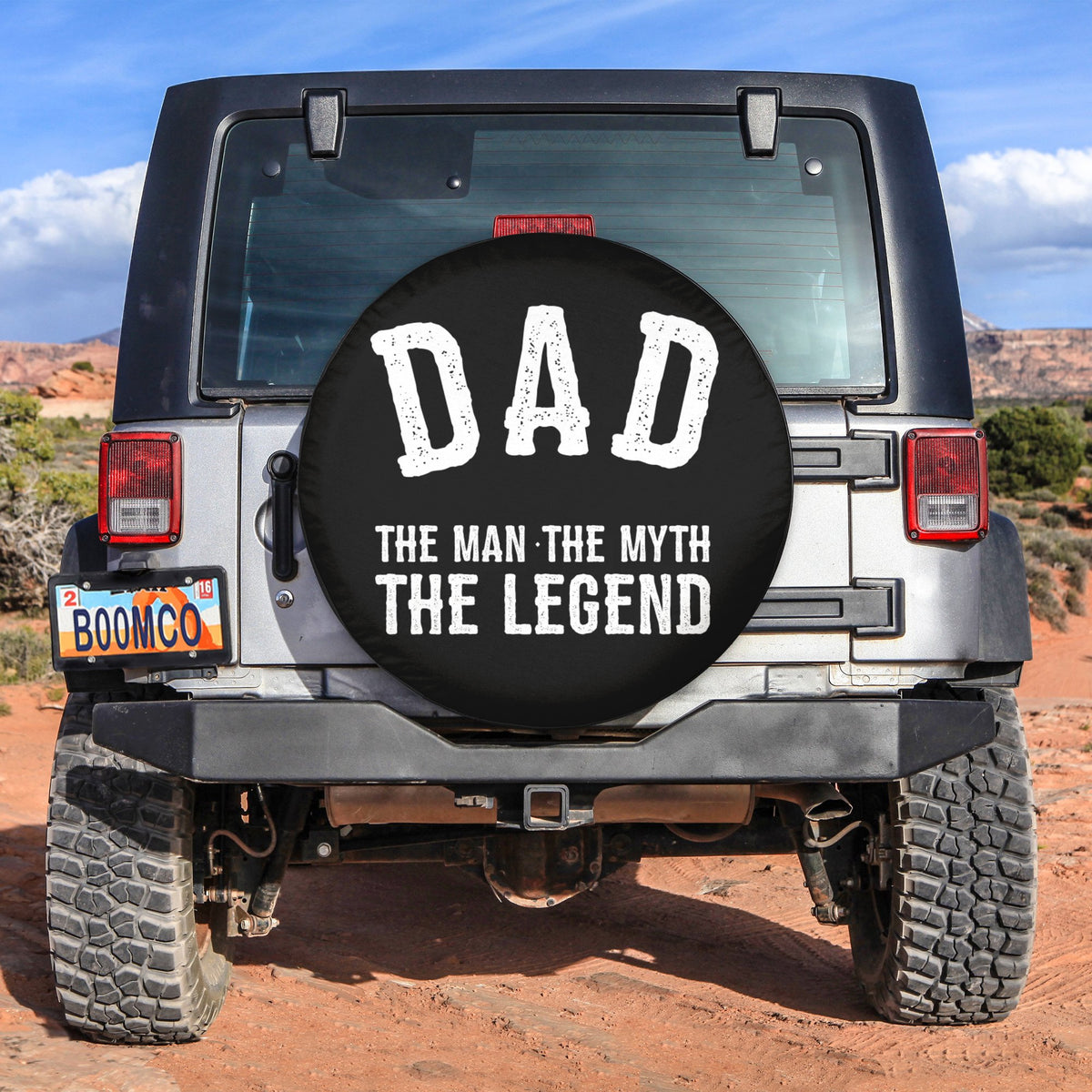 Black spare tire cover with DAD and THE MAN THE MYTH THE LEGEND lettering