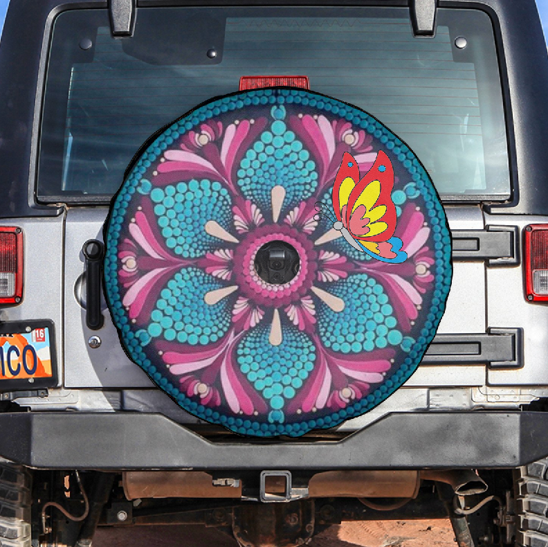 Spare tire cover in turquoise, pink, and magenta with butterfly and central camera window