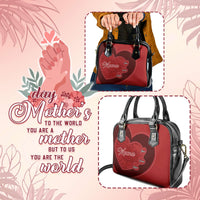 Red heart-themed handbag with black top handles and front heart patch design