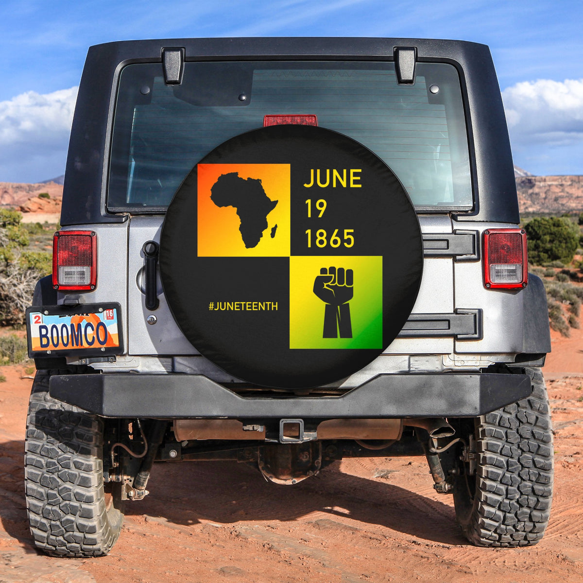 Spare tire cover with Africa map and Juneteenth text graphic, round black design