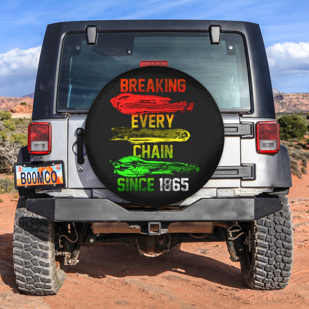 Black spare tire cover with Breaking Every Chain Since 1865 multicolor graphic