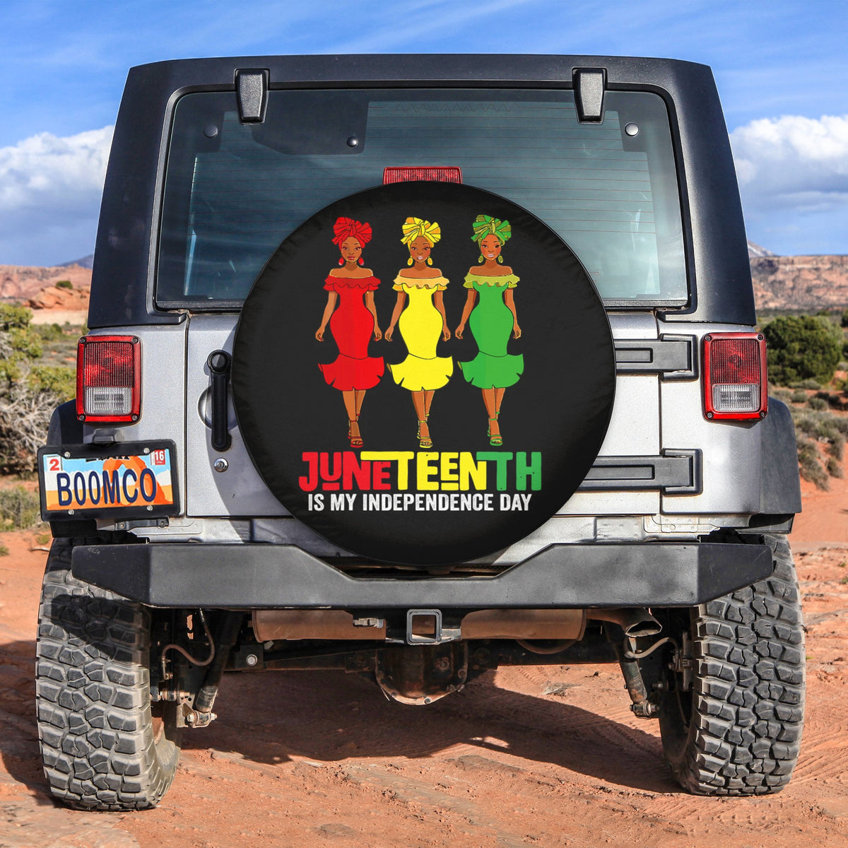 Black spare tire cover with Juneteenth Independence Day text and three figure graphic