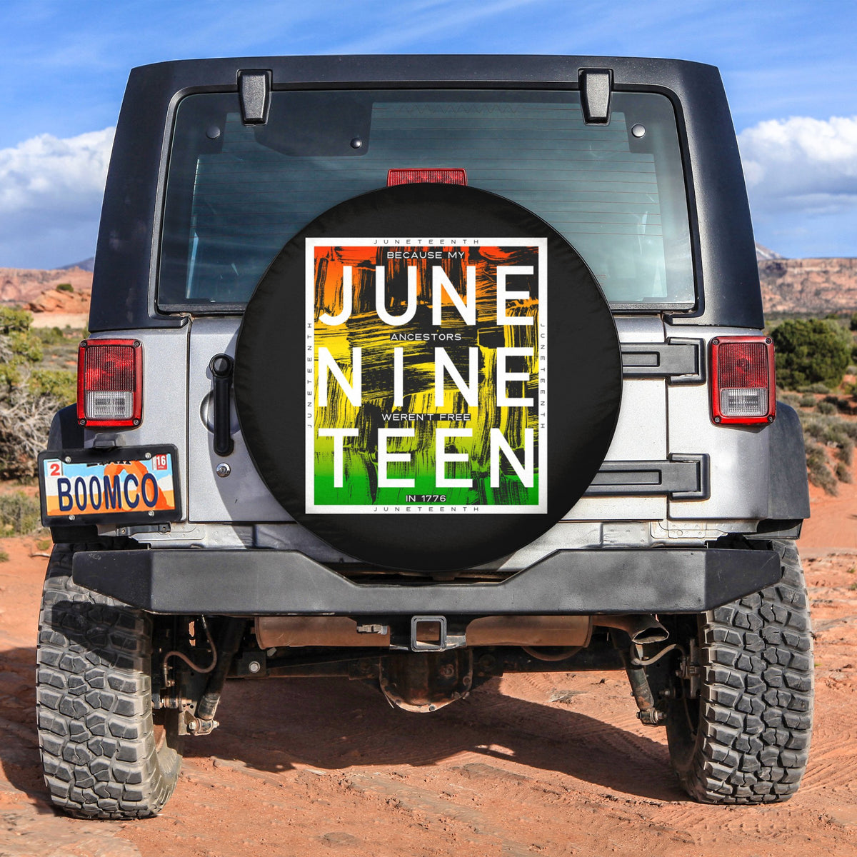 Juneteenth spare tire cover with 'June Nine Teen' text graphic, mounted on rear vehicle