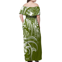 Off-shoulder long green womens dress with white tribal pattern and floral accents