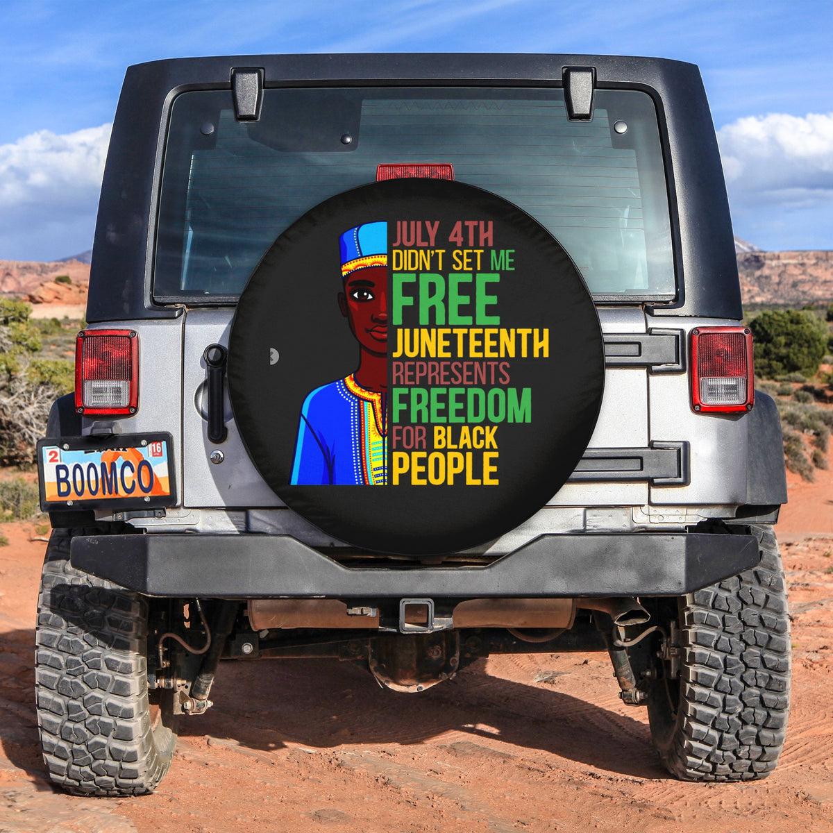 Black spare tire cover with Juneteenth text and illustrated person on front