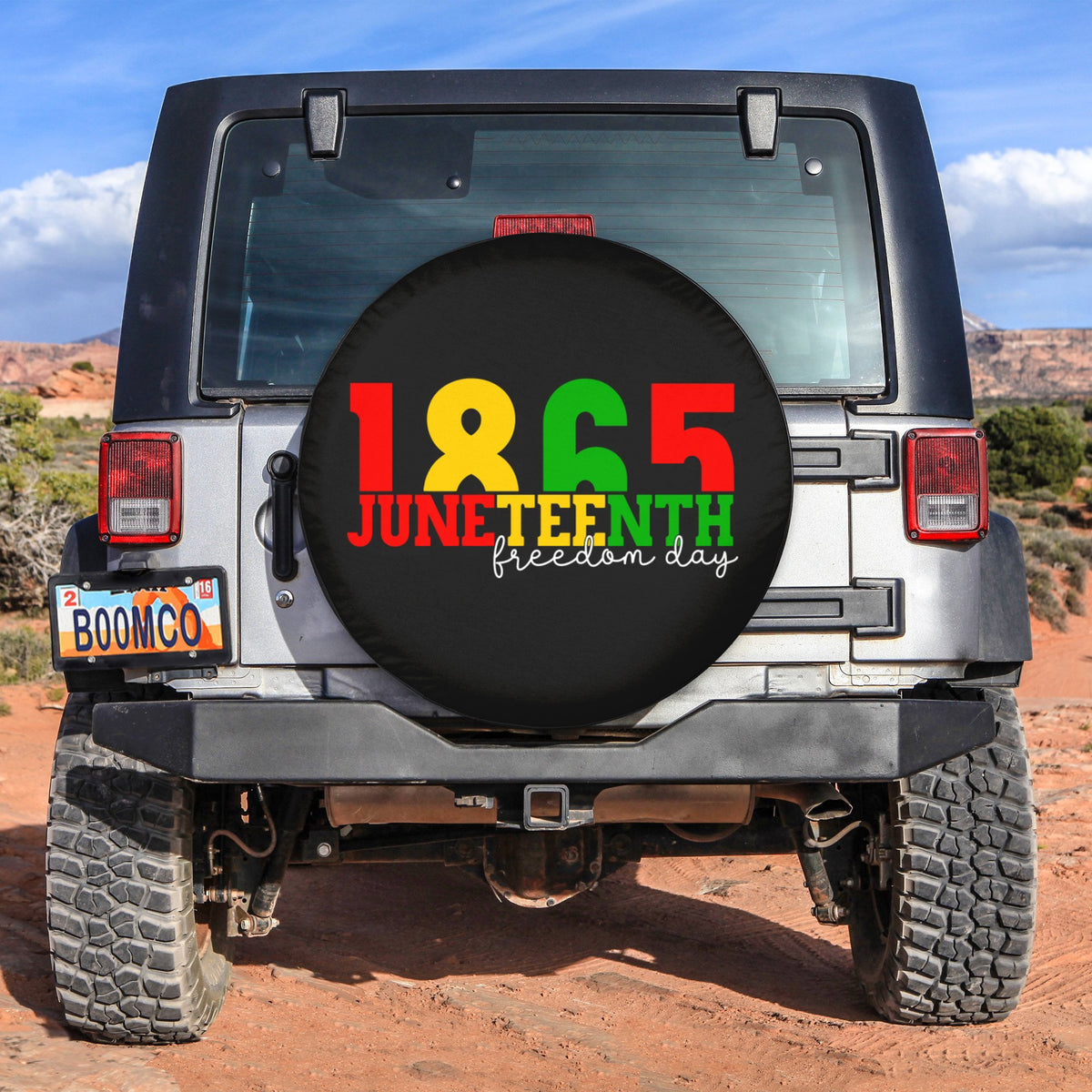 Spare tire cover: black with '1865 Juneteenth freedom day' graphic in red, yellow, green