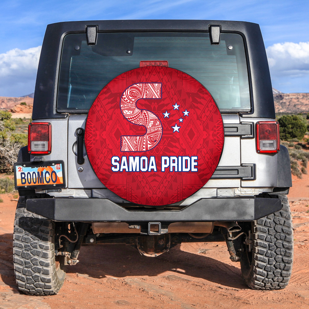 Red spare tire cover with Samoa Pride emblem and strap mounting clips