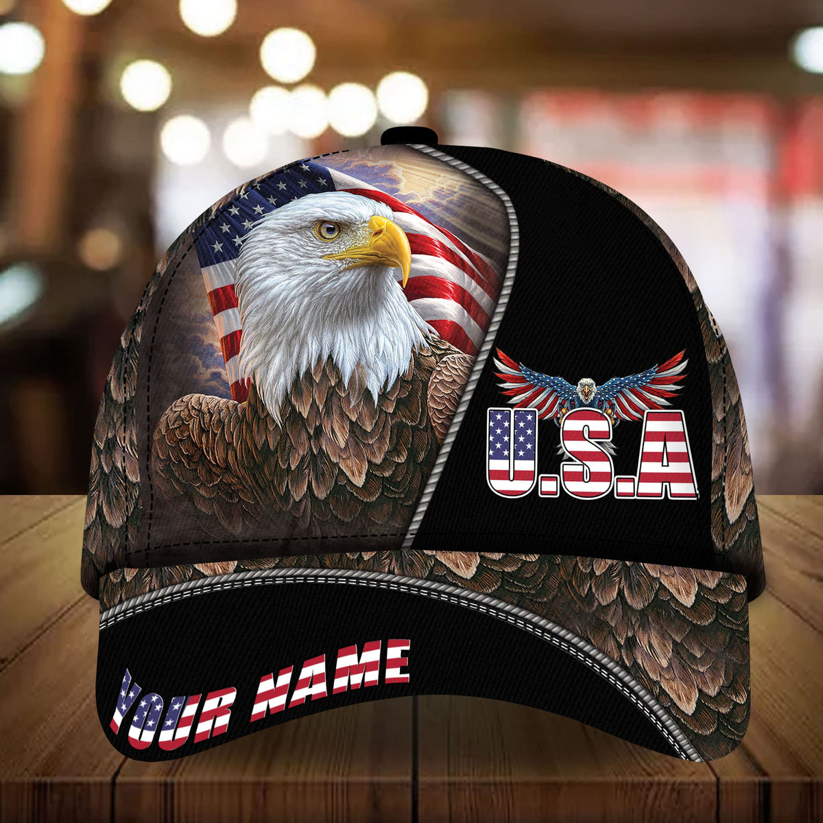 Black baseball cap with bald eagle patch, U.S.A. emblem, and flag-style graphics