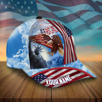Patriotic baseball cap with USA, eagle, and liberty statue scene; 'YOUR NAME' front patch