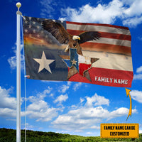 Personalized grommet hanging flag on pole with eagle and Texas star patch accents